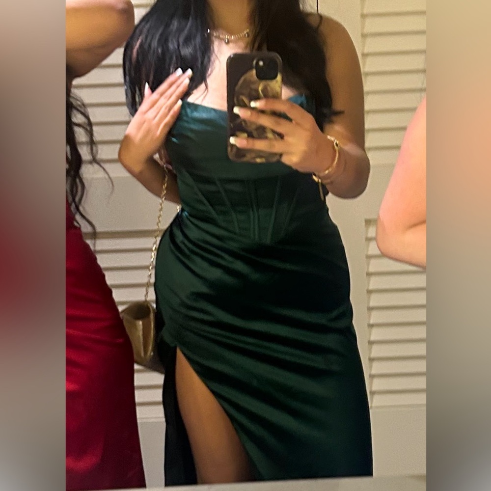 Excellent condition. for large chest, corset bodice, front slit, drape neckline.